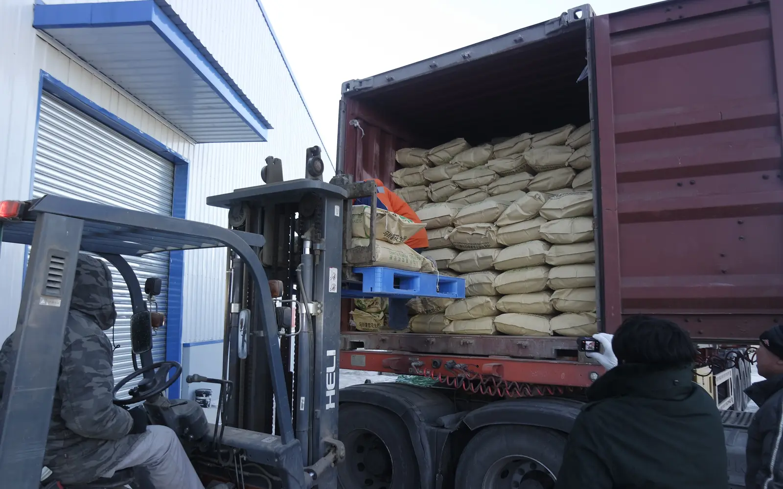 Potato ingredient bags loaded into an export container